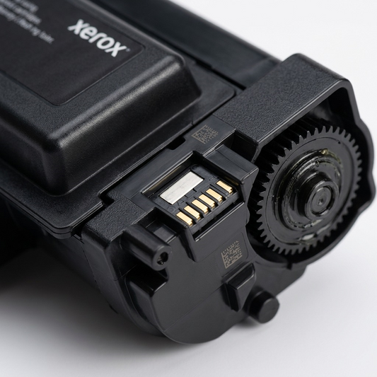 Macro close-up of Xerox 006R04401 toner cartridge chip contacts and drive gear.