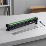 Xerox 101R00602 drum cartridge on a grey surface next to a 12-inch ruler and pen for scale.