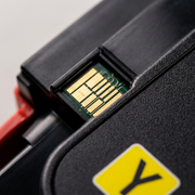 Macro photograph focusing on the data contacts and "Y" icon surface: Extreme close-up.
