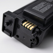 Extreme macro photo focusing on the gold-plated contact points of the Xerox 006R04399 toner cartridge.