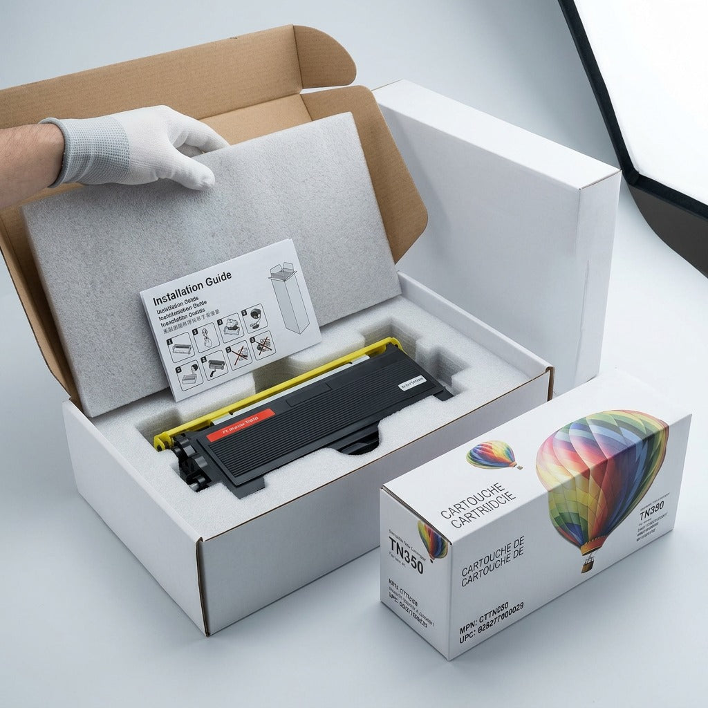 A premium close-up of the TN350 toner cartridge, showing it secure in protective shipping foam within a clean, open box.