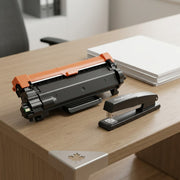 Balloon Brand compatible TN830XL toner cartridge shown next to a standard office stapler for size comparison.