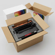 A series of panels showing a secure unboxing of a foam-nested black toner cartridge from a shipping box.