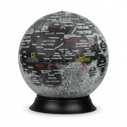 A centered, high-resolution hero shot of the illuminated National Geographic Moon Globe on its black base.
