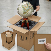 Premium protective packaging materials, a heavy-duty cardboard sleeve, and a high-density foam insert are open, revealing the intact antique parchment ocean globe on its distinct, undamaged tripod stand.