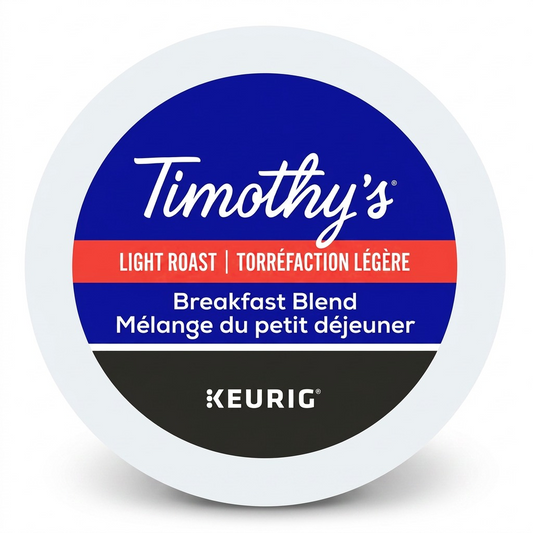 A high-resolution, centered photograph of a single Timothy's Breakfast Blend Keurig K-Cup, as seen from a top-down view, featuring all specific text and logos: Timothy's script, Light Roast, Breakfast Blend, and Keurig, against a pure white background.
