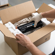Realistic unboxing scene: product is safe in sturdy cardboard box, protected by biofoam inserts.