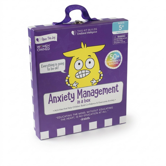 A high-resolution, pure white background product shot of the Open The Joy Anxiety Management in a Box, showing the purple packaging with all original text and logos, including the character and carry handle.