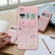 Pink Casio FX-9910CW ClassWiz scientific calculator on a study desk with notes and a textbook.