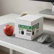 Scale comparison image shows one small W. Ralston garbage liner box next to an apple on a desk.
