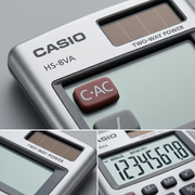 Macro details of Casio HS-8VA calculator showing solar panel, metal faceplate, and 8-digit LCD.