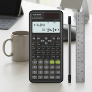 Casio FX-991ESPLUS2 scientific calculator shown for scale next to a 15cm ruler, pencil, and coffee mug.