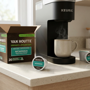 A lifestyle image featuring the Van Houtte Nicaragua Organic Medium Roast K-Cup on an illuminated countertop.
