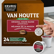 Van Houtte decaf coffee pods shown at scale on a modern desk.