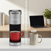 Keurig K-Suite Commercial Gen2 Brewer next to a 12-oz mug and ruler for scale reference.