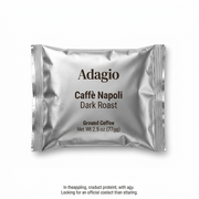 A high-resolution, centered image of a silver fraction-pack ground coffee packet. The label text and product details are sharply defined on a pure white background.