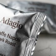 Macro shot of the metallic foil product pouch focusing on the heat-sealed edge and precise, small text printing.