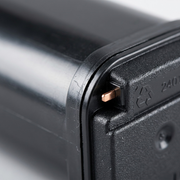 Macro photo of Static Control toner cartridge with focused metal contact pin.