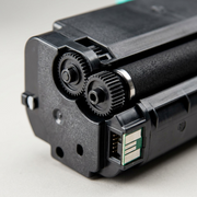 A precision close-up shot of the Static Control Lexmark compliant toner cartridge showing the intricate gears and developer roller.