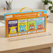 A close-up photograph comparing the Open The Joy activity kit from image_0.png with a standard 12-inch ruler on a wooden table.