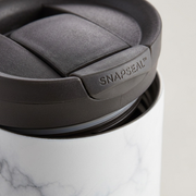 A close-up and highly detailed view of the Contigo Huron 2.0 Couture cup's precise SnapSeal lid mechanism.