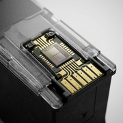 Extreme macro view of the PG-260XL ink cartridge, focused deeply on the details of the FINE print head and gold contact pads.