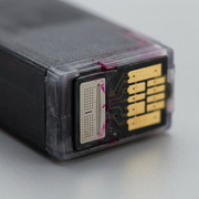 Detailed macro view of the Canon CLI-281XL magenta prism in high contrast.