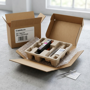 Alt text: Accurate Canon CLI-281 Magenta ink cartridge unboxed safely on protective packaging with tools.