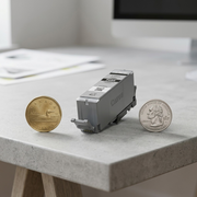 PGI-280XXL ink cartridge scale reference next to a Canadian loonie and US quarter coins.