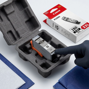 Premium Canon PGI-280XXL cartridge in protective custom-molded pulp shipperTray, open near its retail box.