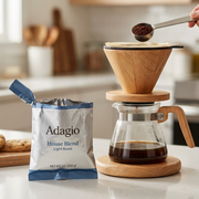 lifestyle photo: Adagio House Blend coffee grounds being brewed in a Keurig K-Cup machine.