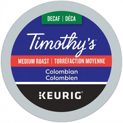 A high-resolution, pure white background studio packshot of the Timothy's Decaf Colombian K-Cup pod. The image captures the crisp details and canonical branding as a premium ecommerce hero shot, focusing on the specific product referenced.