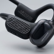 Close-up view highlighting the textures, controls, and OPN SOUND logo on the bone conduction headphone.