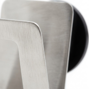 Extreme macro detail showing the brushed finish of the stainless steel Happy Sinks Sponge Holder.