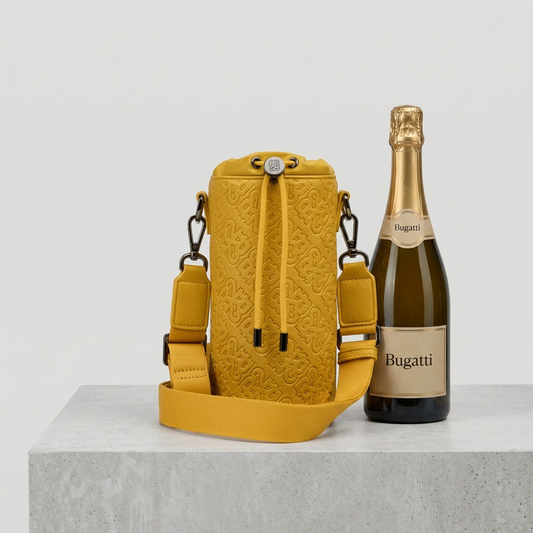 A yellow Bugatti-branded bottle bag displayed next to a matching champagne bottle for size reference.
