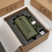 A secure, pristine Rick Ross Champagne Bag in its custom protective packaging.