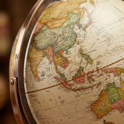 Macro detail of the Replogle Commander Ii 16" antique ocean globe, displaying French cartography.